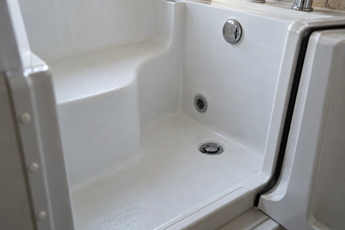 Drain and overflow inside a walk-in bathtub